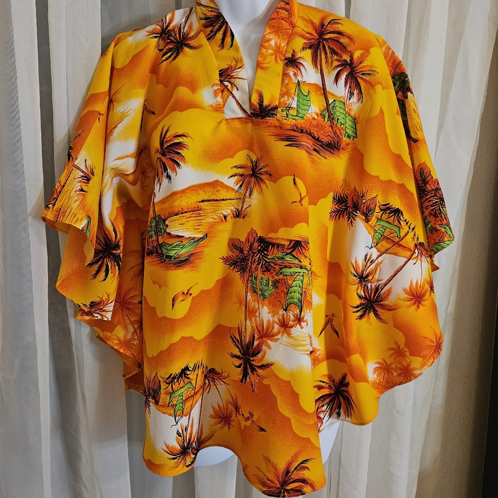 Made in Hawaii blouseSunset orange featuring a Hawaiian theme. Sz M